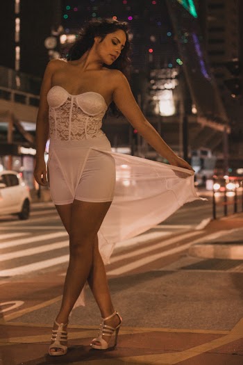 Woman Standing at Road