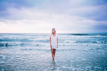 woman standing at sea