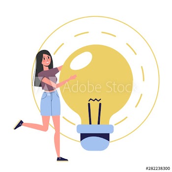 Woman standing at the big light bulb