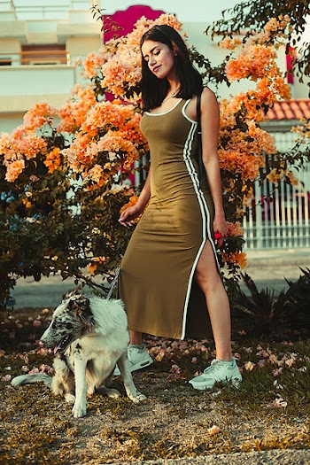 Woman Standing Beside Bull Mastiff