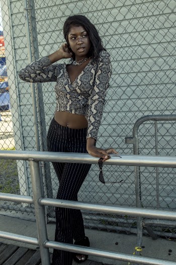 Woman Standing Beside Handrail