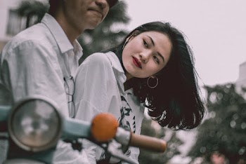 Woman Standing Beside Man
