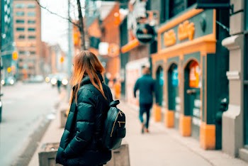 Woman Standing Beside Road