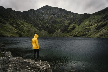 Woman Standing Beside The River
