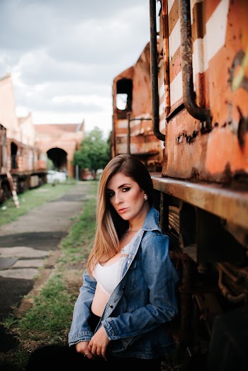 Woman Standing Beside Train