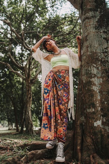 Woman Standing Beside Tree