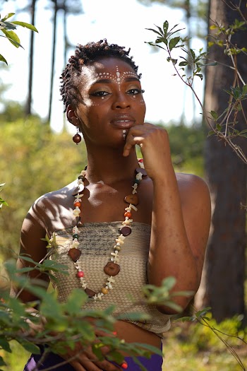 Woman Standing Beside Tree
