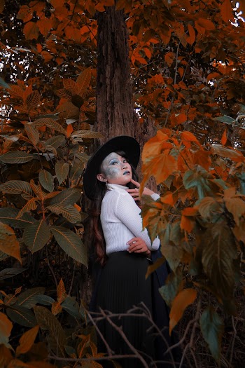 Woman Standing Beside Tree
