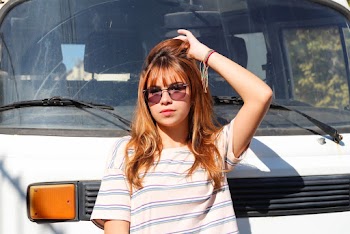 Woman Standing Beside Truck