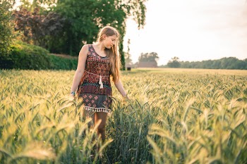 Woman Standing Beside Wheat Field