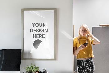Woman standing by a picture | Free PSD Mockup - rawpixel