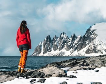 Woman Standing by the Beach