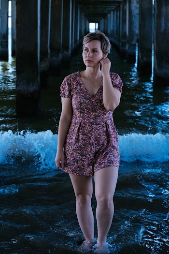 Woman Standing in Body of Water