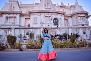 Woman Standing in Front of a Building