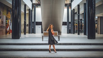 Woman Standing in Front of Building