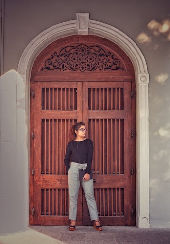 Woman Standing in Front of Closed Door