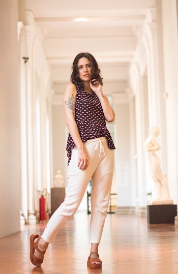 Woman Standing In Hallway