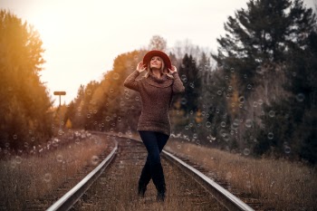 Woman Standing in Railway
