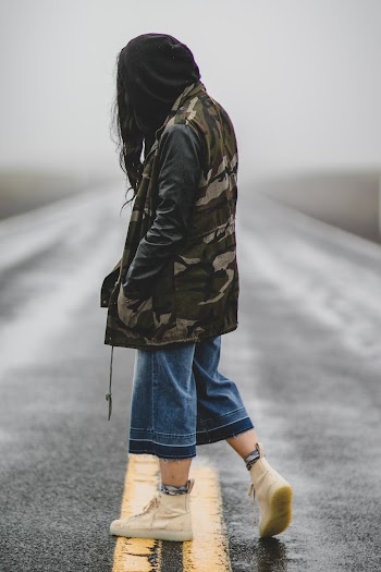 Woman Standing in Road