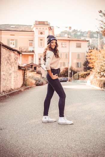 Woman Standing in the Middle of Road
