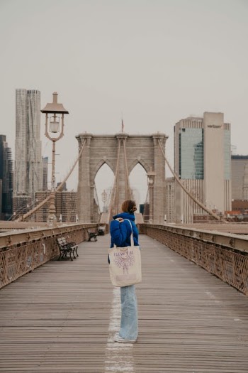 Woman Standing in the Middle of the Bridge · Free Stock Photo