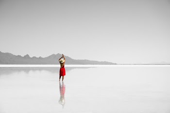 Woman Standing In The Middle Of The Sea