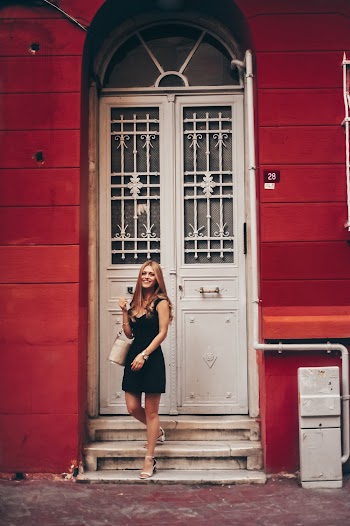 Woman Standing Infront Of The Door