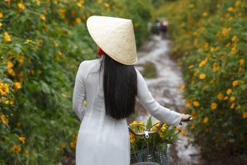 Woman Standing Looking to Her Left