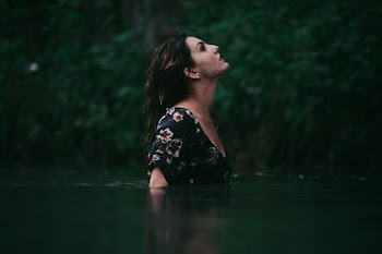 woman standing looking up