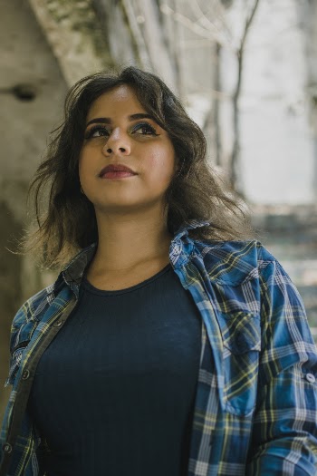 Woman Standing Looking Up