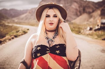woman standing middle of road
