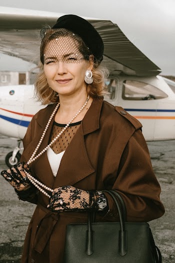 Woman Standing Near Airplane