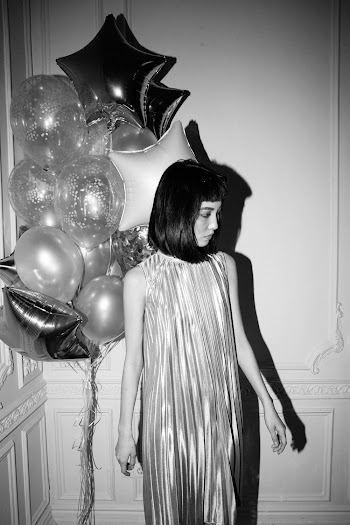 Woman Standing Near Balloons