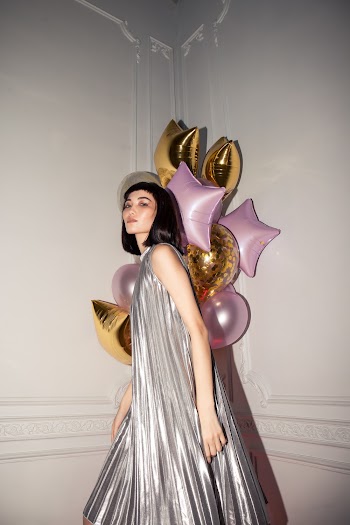 Woman Standing Near Balloons