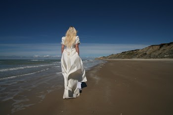 Woman Standing Near Body of Water