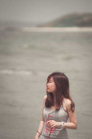 Woman Standing Near Body of Water