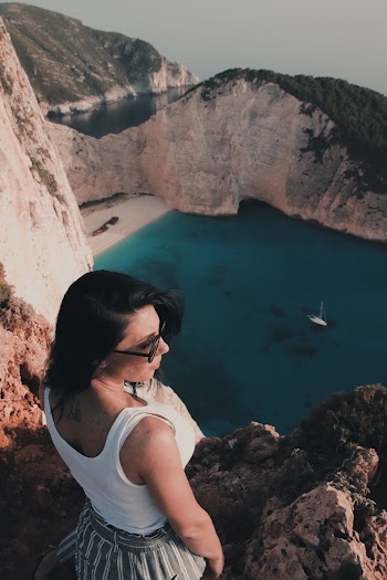 Woman Standing Near Body of Water
