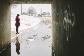 Woman Standing Near Body of Water