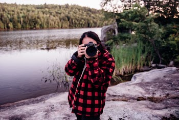 Woman Standing Near Body Of Water