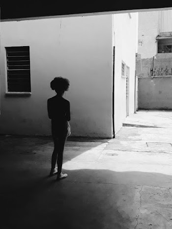 Woman Standing Near Building