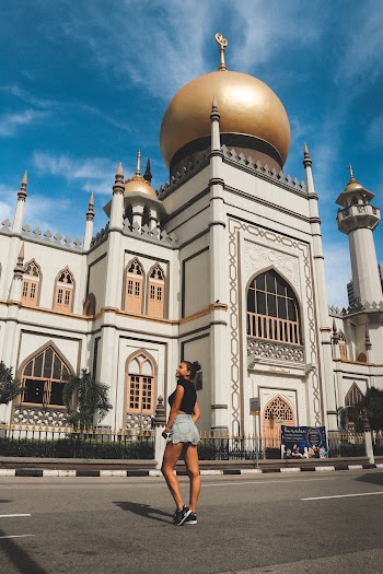 Woman Standing Near Dome Building