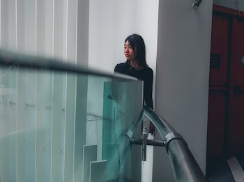Woman Standing Near Door