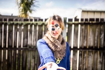 Woman Standing Near Fence