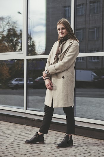 Woman Standing Near Glass Building