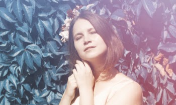 Woman Standing Near Green-Leafed Plant