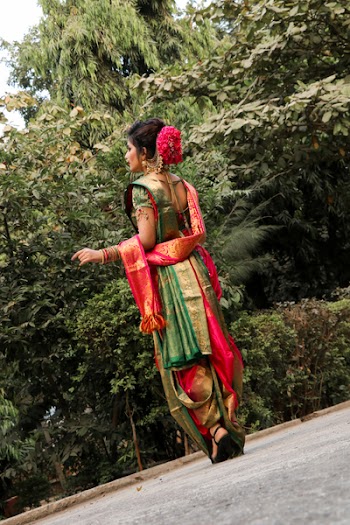 Woman Standing Near Green Leafed Trees