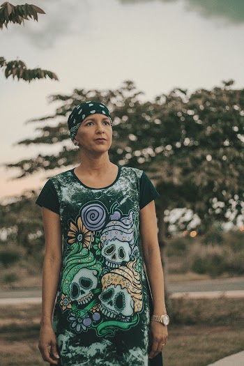 Woman Standing Near Green Trees