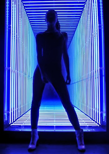 woman standing near lights