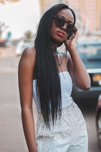 Woman Standing Near Parked Car