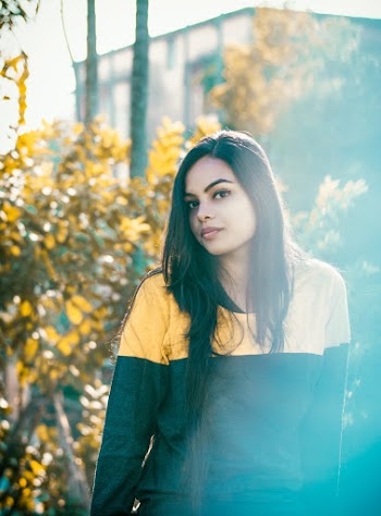 Woman Standing Near Plants